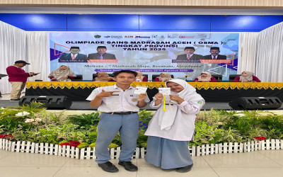 Gio dan Khansa Siswa MAN Aceh Singkil Wakili Aceh Singkil OSMA ke Provinsi Bidang  Kimia dan Geografi.